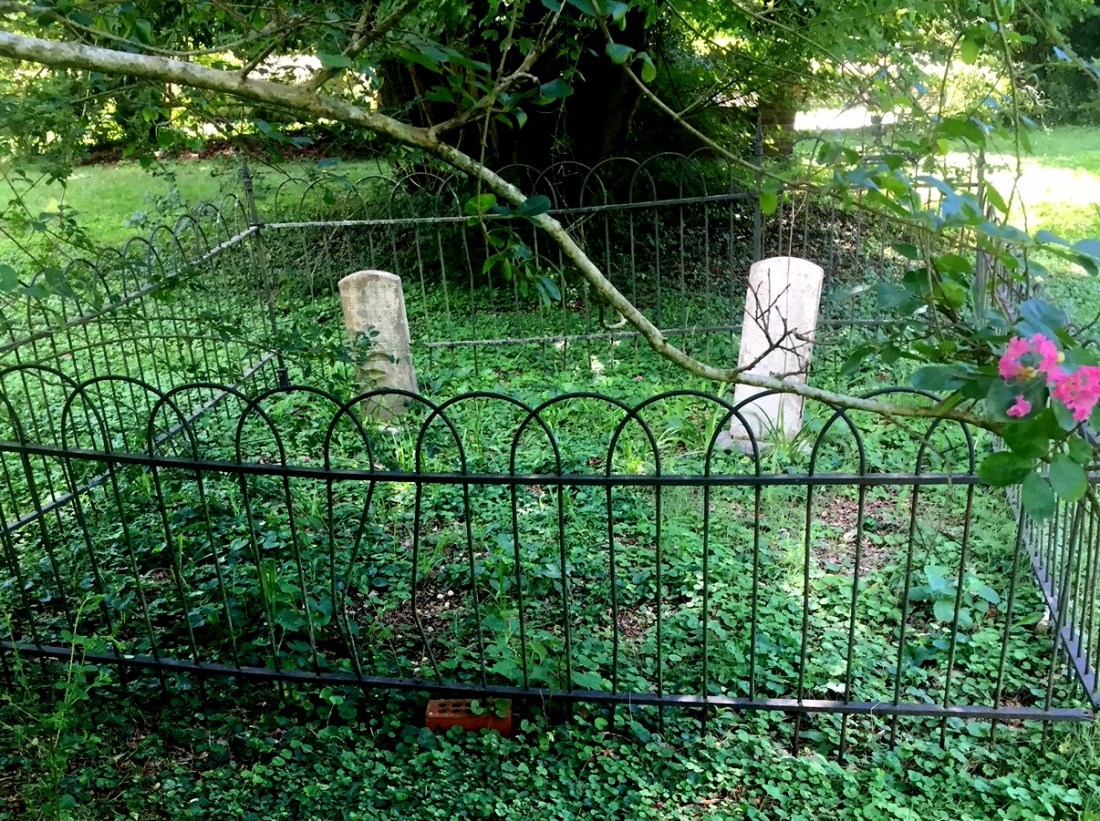tombstones and fence